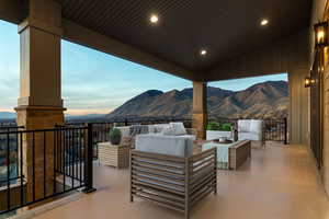 Main level deck with view of valley and surrounding mountains, outdoor lounge area