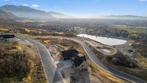 Aerial overview of property's location featuring a water, valley, and mountain view