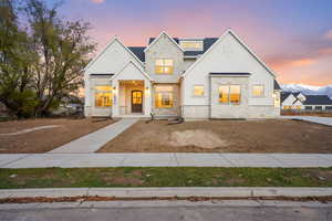 View of front of home featuring stone siding