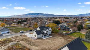 Aerial view of residential area featuring mountains
