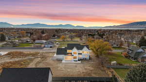 Aerial view of residential area featuring a mountain backdrop