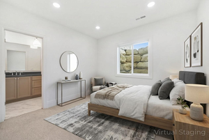 Bedroom with light carpet, light marble finish flooring, and recessed lighting