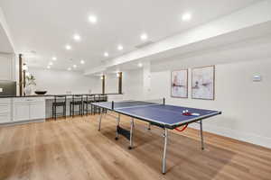 Playroom featuring recessed lighting and light wood-style flooring