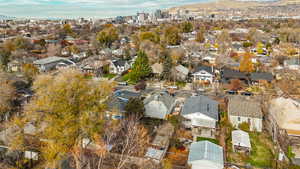 Aerial view of residential area featuring a mountainous background