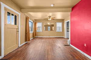 Foyer featuring wood-type flooring and a ceiling fan
