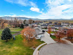 Aerial view of residential area with a mountainous background