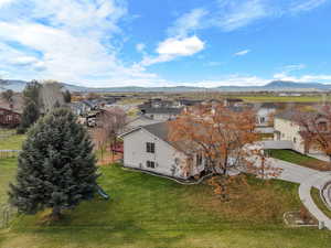 Aerial perspective of suburban area featuring mountains