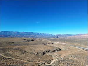 View of mountain backdrop with a desert landscape