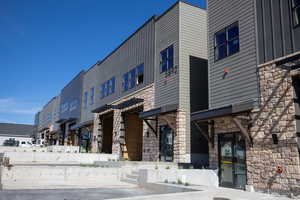 View of property with a residential view