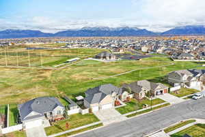 Aerial view of residential area featuring the clubhouse of Cranefield Golf Course