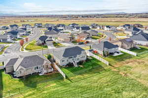 Aerial view of residential area featuring mountains