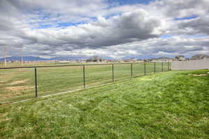 View of yard featuring a mountain view and fairway number 1 of Cranefield Golf Course
