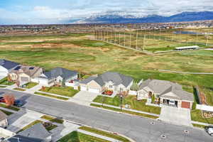 Aerial view of residential area featuring mountains