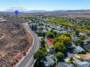 Aerial perspective of suburban area featuring mountains