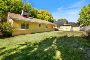 Back of property with stucco siding