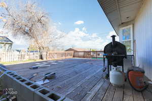 Wooden terrace with area for grilling