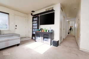 View of carpeted living area