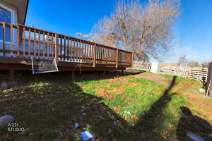 View of yard featuring a wooden deck