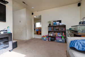 Misc room with carpet floors