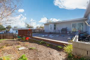 Wooden deck with a grill