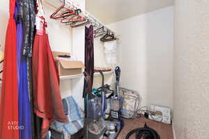 Walk in closet featuring carpet flooring