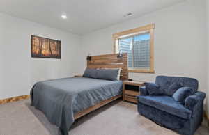 Bedroom with carpet and recessed lighting