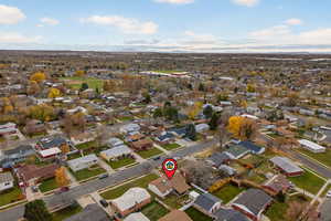 Aerial perspective of neighborhood with a mountain backdrop