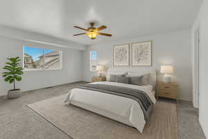 VIRTUALLY STAGED Carpeted bedroom featuring ceiling fan and baseboards