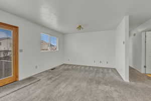 View of carpeted spare room
