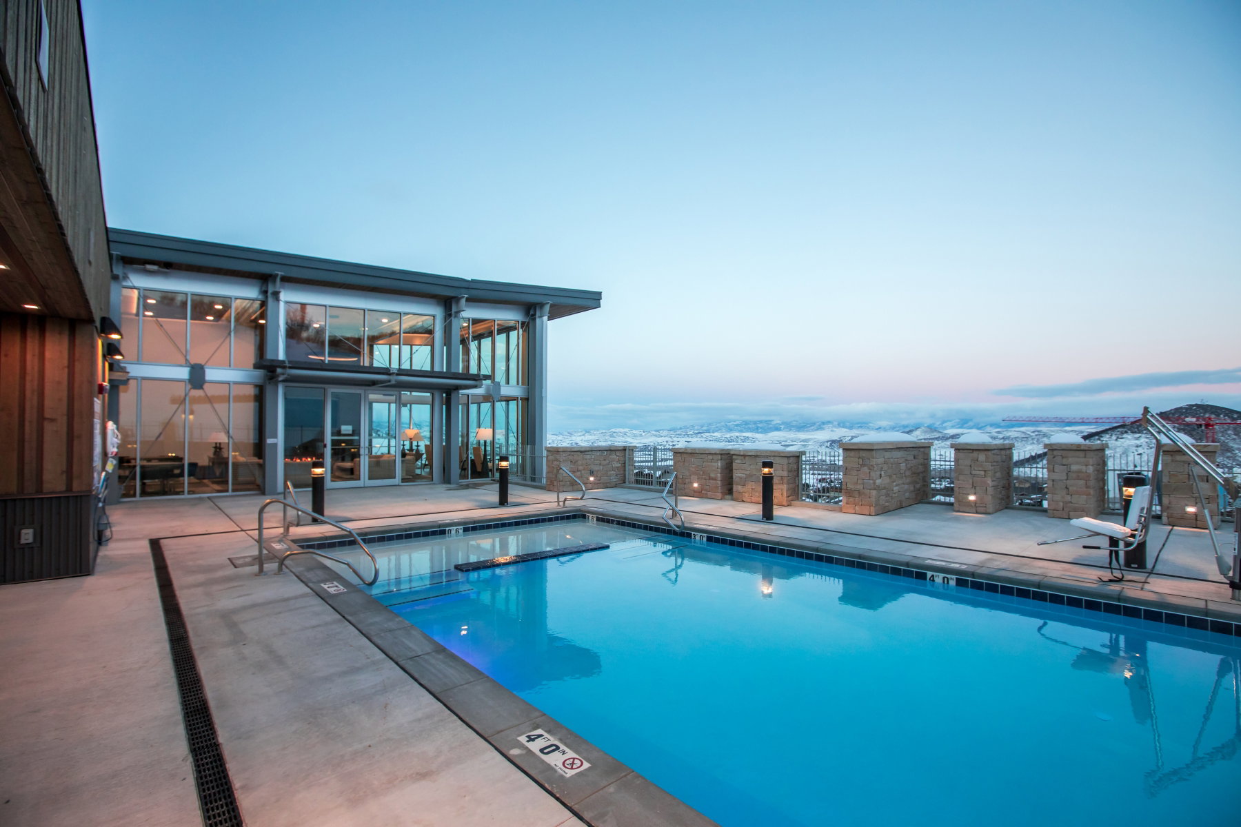 Community pool with a patio area
