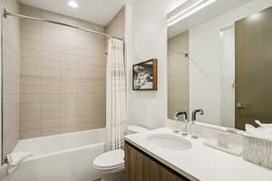 Full bath with shower / bath combo and vanity