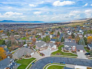 Aerial perspective of suburban area featuring mountains