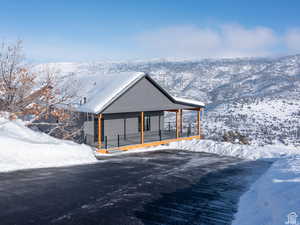 View of front facade featuring a porch