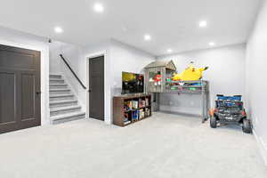 Rec room featuring carpet flooring and recessed lighting