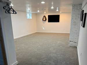 Basement featuring carpet and recessed lighting