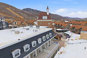 Mountain view featuring nearby suburban area