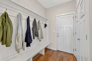Mudroom featuring light wood-style flooring