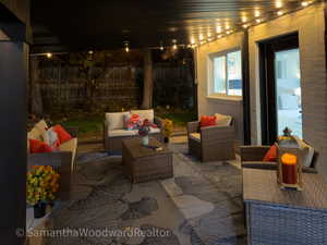 View of patio featuring an outdoor hangout area