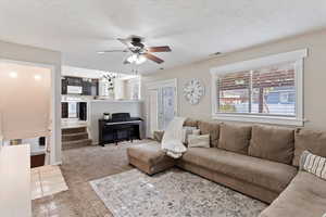 Spacious family room with ceiling fan