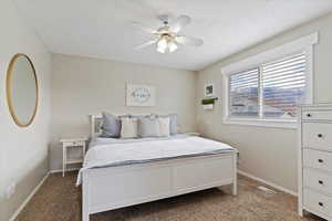 Primary suite offers an updated bathroom and walk-in closet