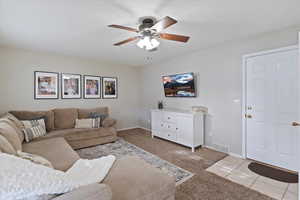 Spacious family room with ceiling fan