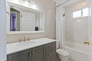 All bathrooms remodeled with floor-to-ceiling tile, new vanities, faucets, lighting, mirrors, flooring, and custom tile showers