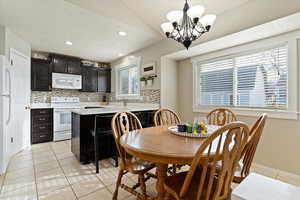 Kitchen features brand-new white quartz countertops & updated cabinetry