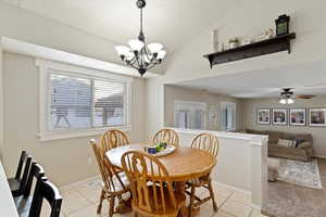 Fresh kitchen with new countertops, tile backsplash and lovely craftsman casing on windows