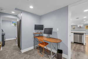 Home office with recessed lighting and healthy amount of natural light