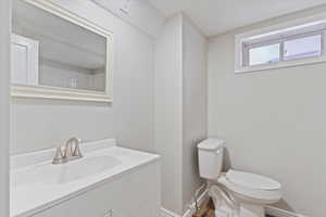 Bathroom with vanity and dark wood finished floors
