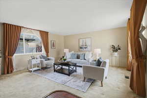 Living area with carpet flooring