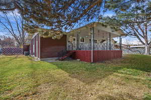 View of home's exterior with brick siding