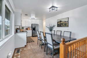 Dining room featuring light tile patterned floors