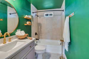 Full bath with shower / bathtub combination with curtain and vanity